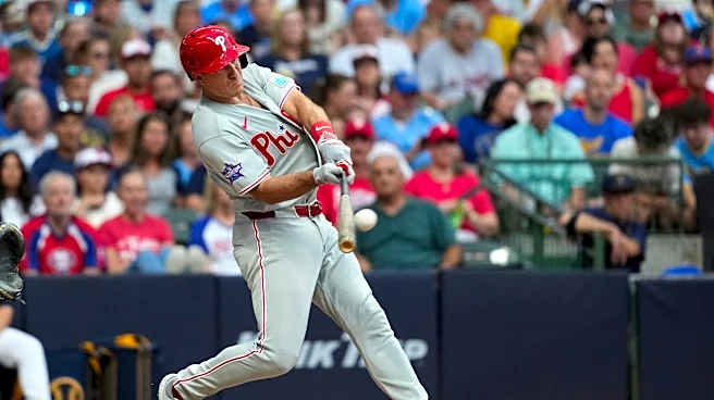 J.T. Realmuto hits 3-run homer in 5-run 6th and Phillies hold off Brewers 9-8