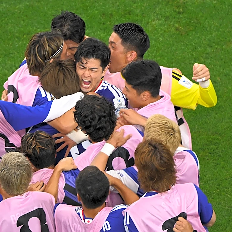 Daichi Kamada's late header gives Japan a 2-2 draw with the Netherlands in World Cup opener for both
