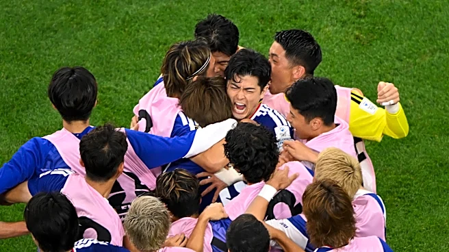 Daichi Kamada's late header gives Japan a 2-2 draw with the Netherlands in World Cup opener for both