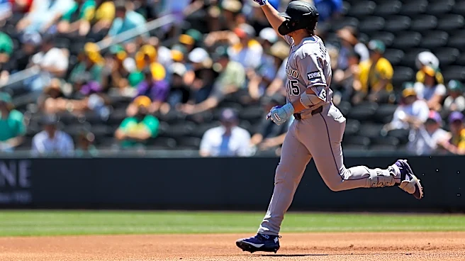 Rockies set club record for runs with 23-9 victory over A's in Las Vegas heat