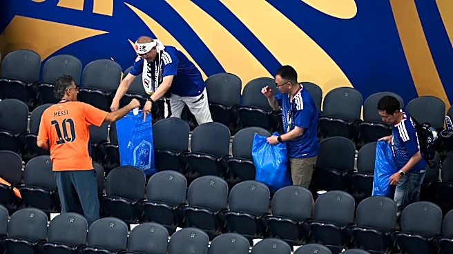 Japan fans use blue bags to uphold a cleansing World Cup tradition after draw