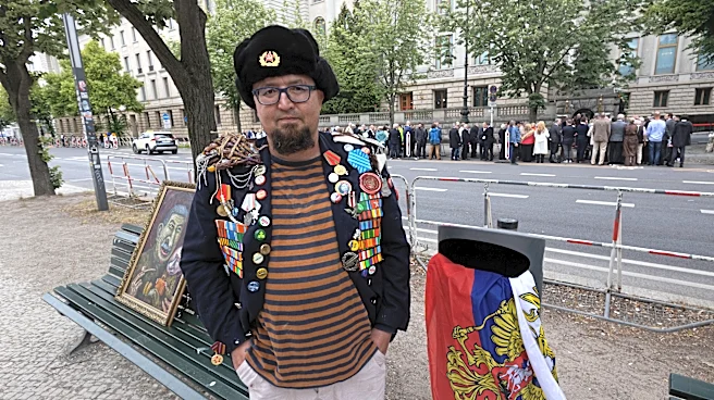 A Russian artist who was critical of Putin is killed near his home in Poland