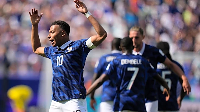 France striker Kylian Mbappé scores his 13th World Cup goal, breaking a tie with Pelé