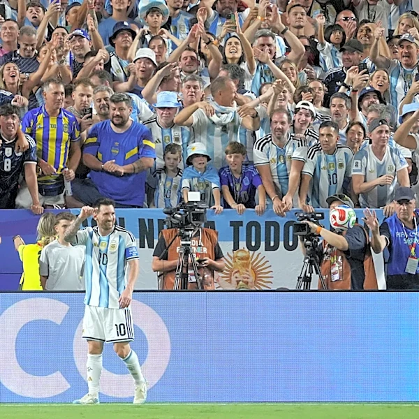 Lionel Messi ties the World Cup goals record with an incredible hat trick as Argentina tops Algeria