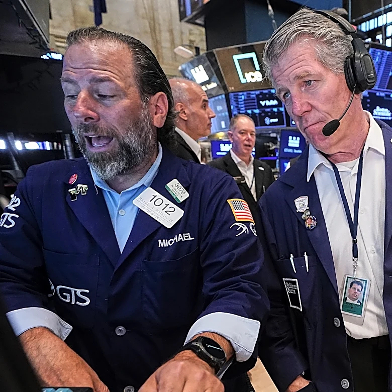 US stocks waver after Fed officials indicate an increase to rates is possible this year