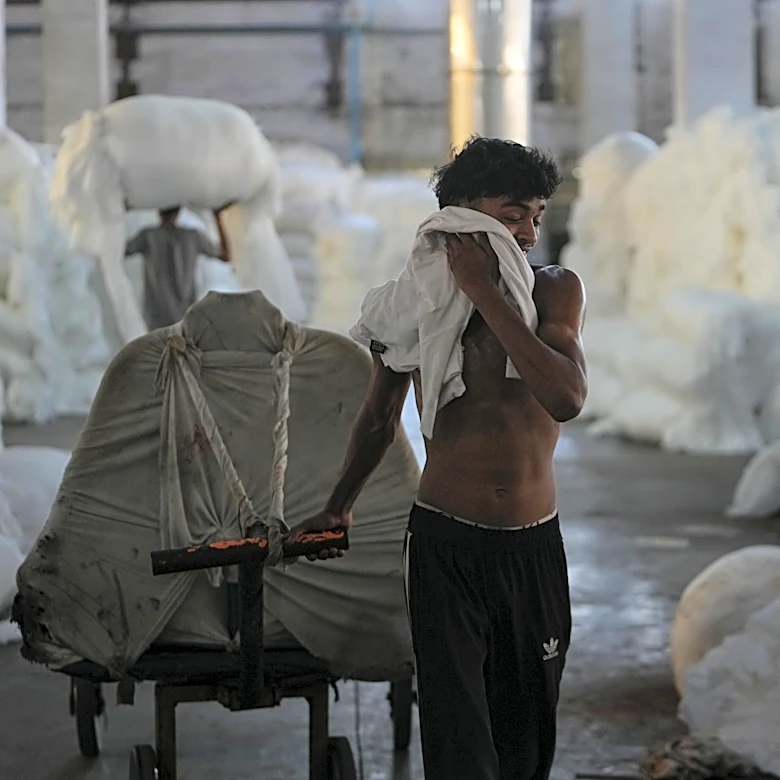 Climate-driven heat in India’s textile factories stifles workers but coolers and ventilation help