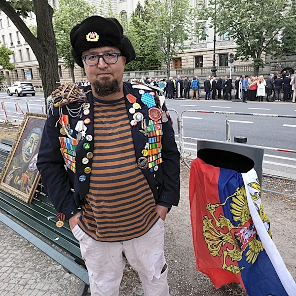 Poland arrests a suspect in daylight killing of a Russian artist critical of Putin
