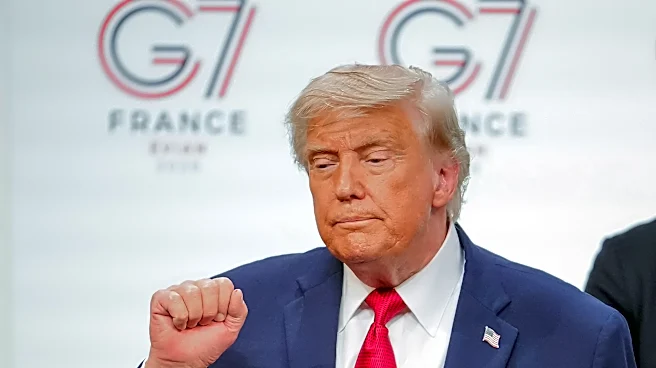 The Latest: Trump pushes back against critics of Iran deal