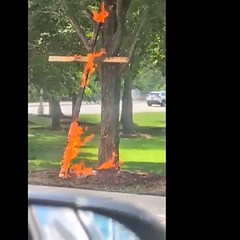 Man who admits setting cross on fire in Chicago park is charged with a hate crime