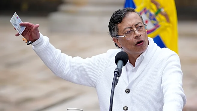 About 100 Colombian guerrilla dissidents disarm under peace talks with government