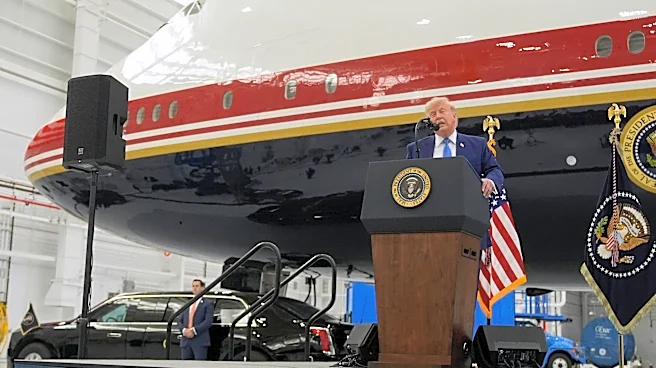 President Donald Trump unveils the new Air Force One, a converted Qatari jet