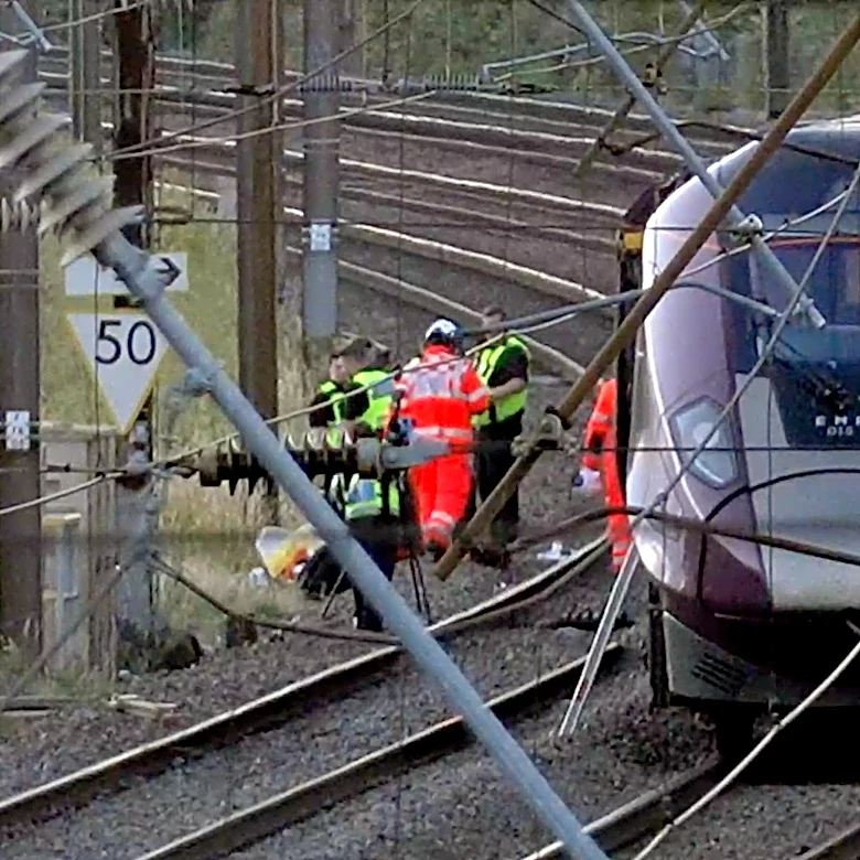 UK police probe cause of train collision that killed driver and left 9 in critical condition