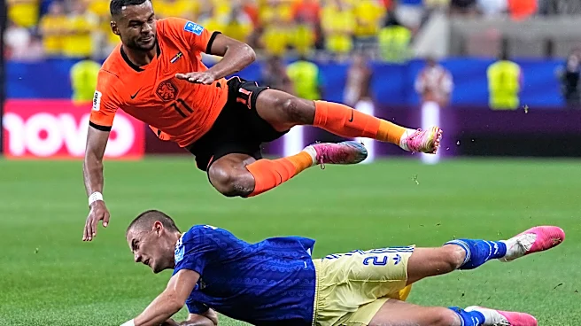 One Extraordinary Photo: Players avoid injury and create a moment of parallel soccer symmetry