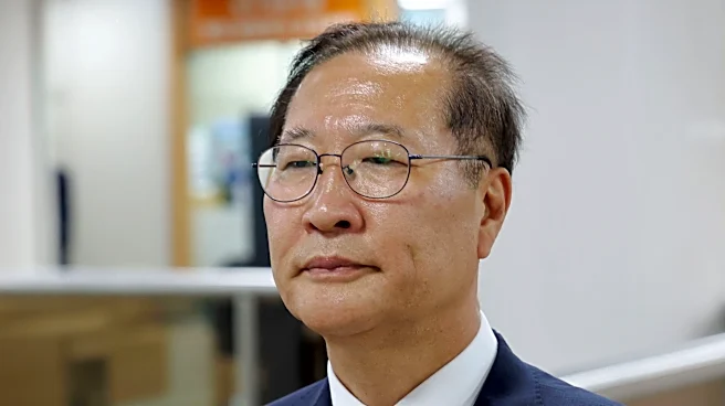 Former South Korean justice minister gets 25-year prison term for role in martial law declaration