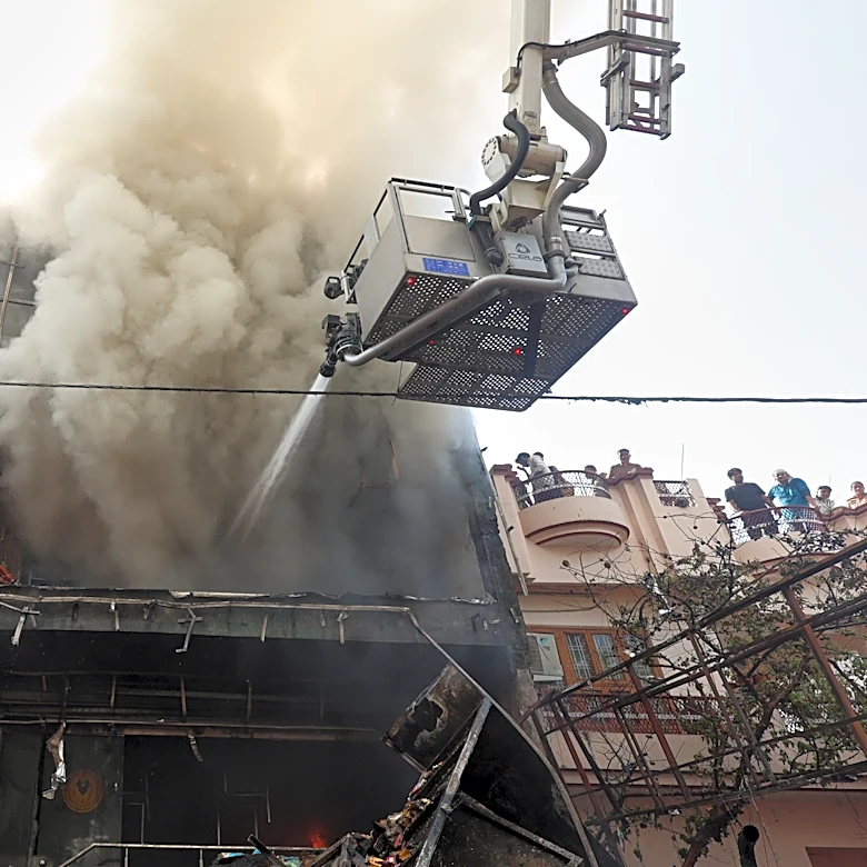 Fire tears through building in northern India, killing 14, mostly students