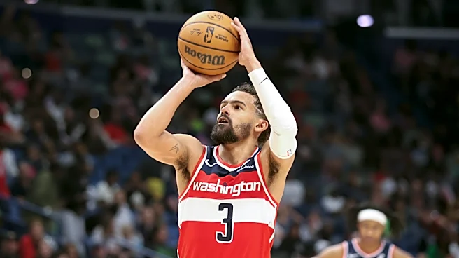 Trae Young agrees to a 4-year extension with Washington Wizards, AP source says
