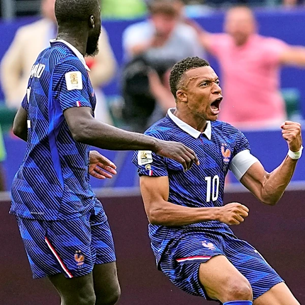 Kylian Mbappé scores 2 goals to lead France to 3-0 win over Iraq and into World Cup knockout stage