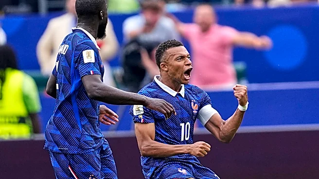 Kylian Mbappé scores 2 goals to lead France to 3-0 win over Iraq and into World Cup knockout stage