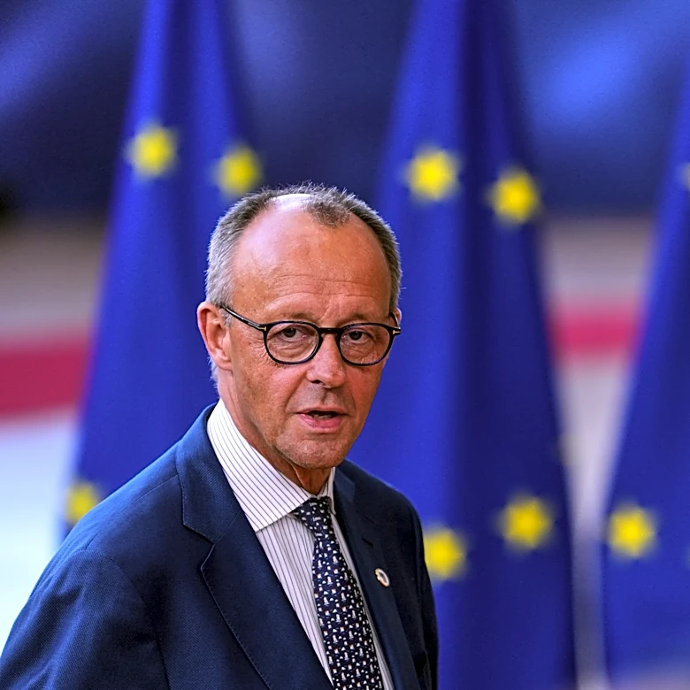 Germany's leader pledges to reform a creaking pension system and says 'failure is not an option'