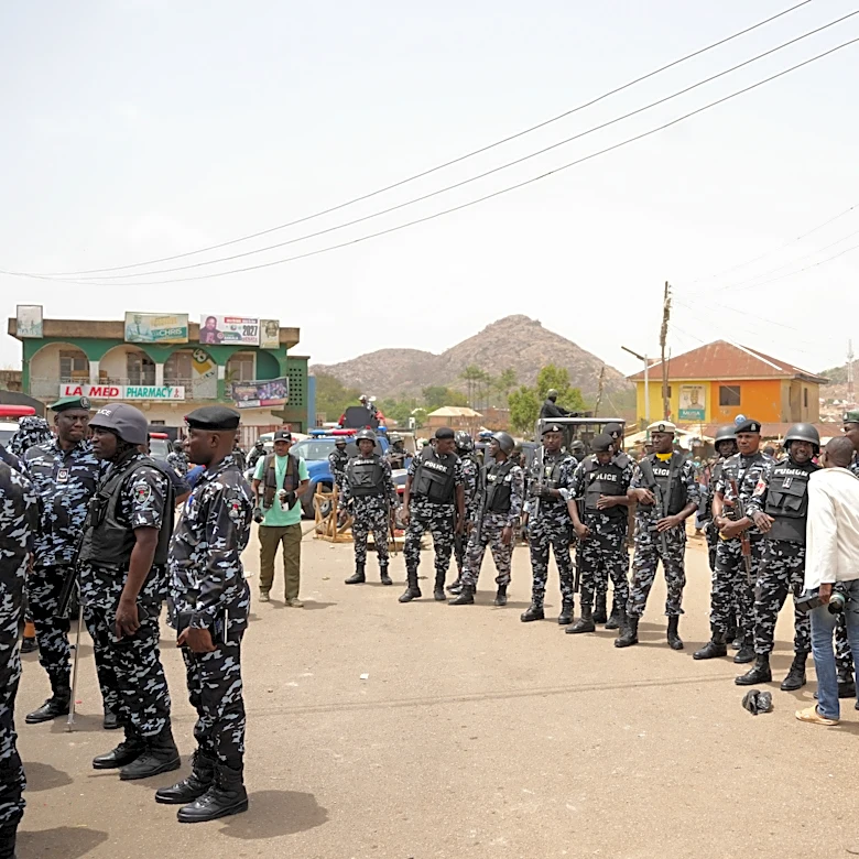 Armed group in Nigeria kills at least 20 people and exchanges gunfire with police
