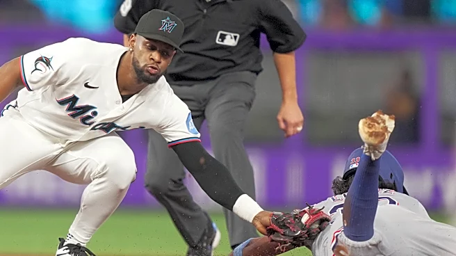 Otto López homers, has another multi-hit game and Marlins beat Rangers 4-2