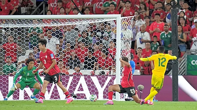 South Africa reaches World Cup knockout round for 1st time with 1-0 win over South Korea