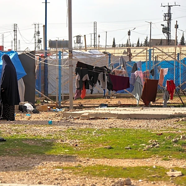 Australian woman and daughter to return from Syrian camp for IS families under strict conditions