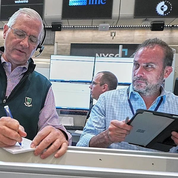 Wall Street drifts in mixed trading after Micron soars and Apple drops