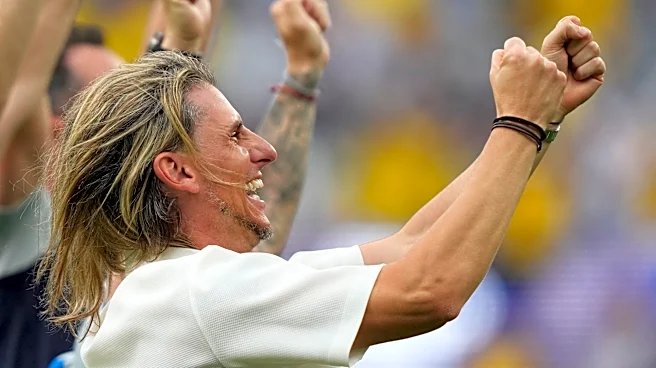 Ecuador coach Sebastián Beccacece shares an emotional moment with his family at the World Cup