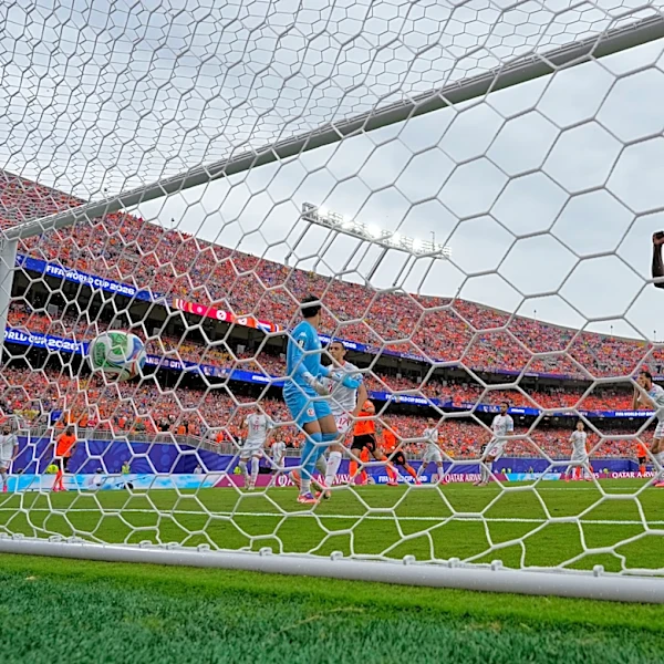 Brian Brobbey and the Dutch roll in the rain to a 3-1 win over Tunisia to top World Cup Group F