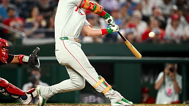 Harper and Hill homers in the 9th help rally Phillies to a 10-5 victory over the Nationals
