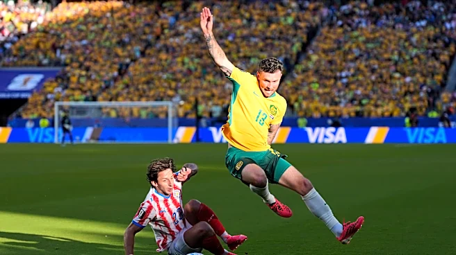 Australia clinches knockout round spot with 0-0 draw; Paraguay also likely to advance