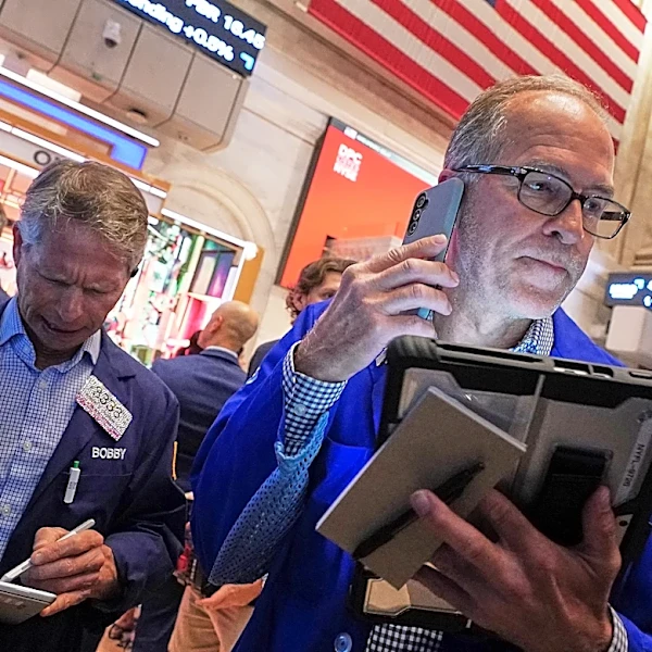 Wall Street follows global markets lower as traders sell to lock in profits after recent AI rallies