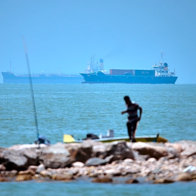 Iranian drones attack Bahrain and a ship is struck in the strait after US airstrikes on Iran