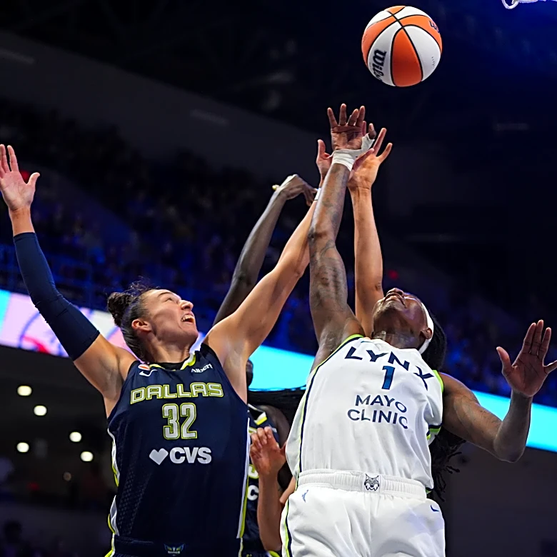 Howard and Miles score 21, Reeve ties WNBA coaching wins record as Lynx beat Wings 85-77