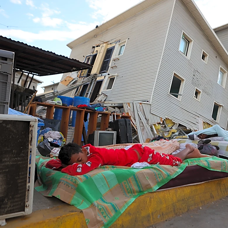 A strong aftershock rattles Venezuela as rescue workers race to find survivors