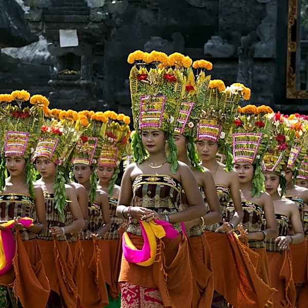 Photos show teen girls in Bali performing a sacred dance during a traditional Hindu ceremony