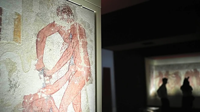 Italy displays paintings from an ancient Etruscan tomb, its latest cultural acquisition