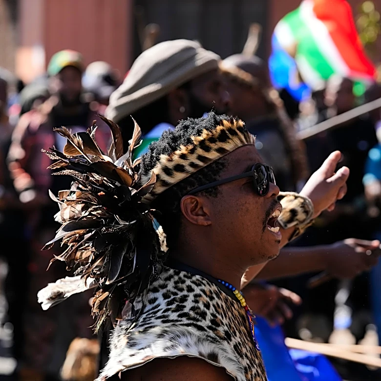 Anti-immigration protesters march in South Africa, as some immigrants leave the country