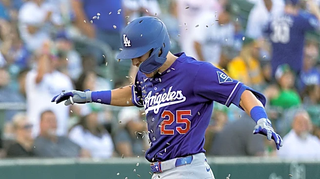 Edman homers, Roberts earns 1,000th managerial win as Dodgers beat A's 9-3