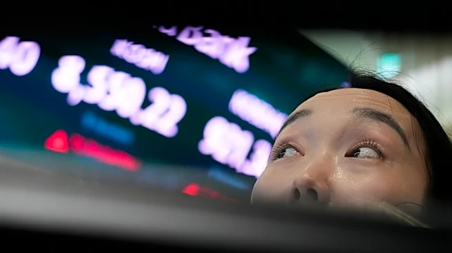 Asian shares trade mixed while the dollar hits a 40-year high against the yen