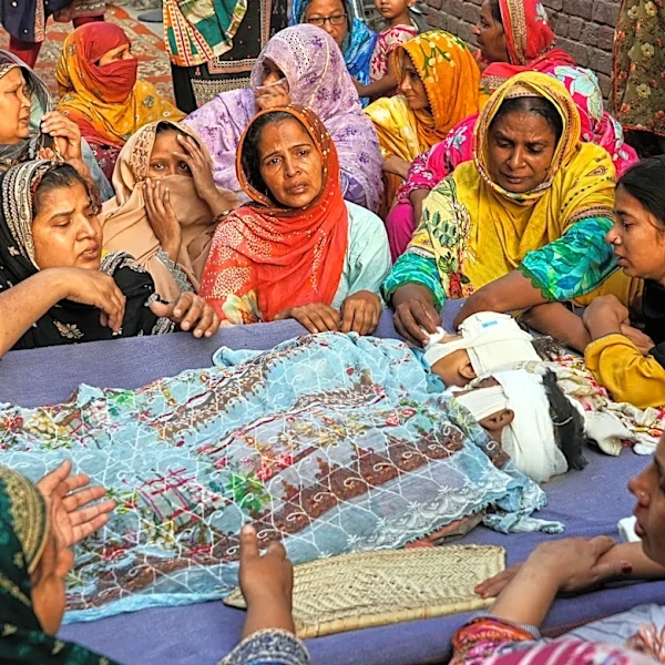 Mourners attend funerals for 14 Pakistani children killed in tutoring center roof collapse