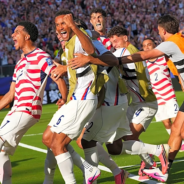 U.S. beats Bosnia-Herzegovina 2-0 to advance to round of 16 and keep its World Cup dreams alive