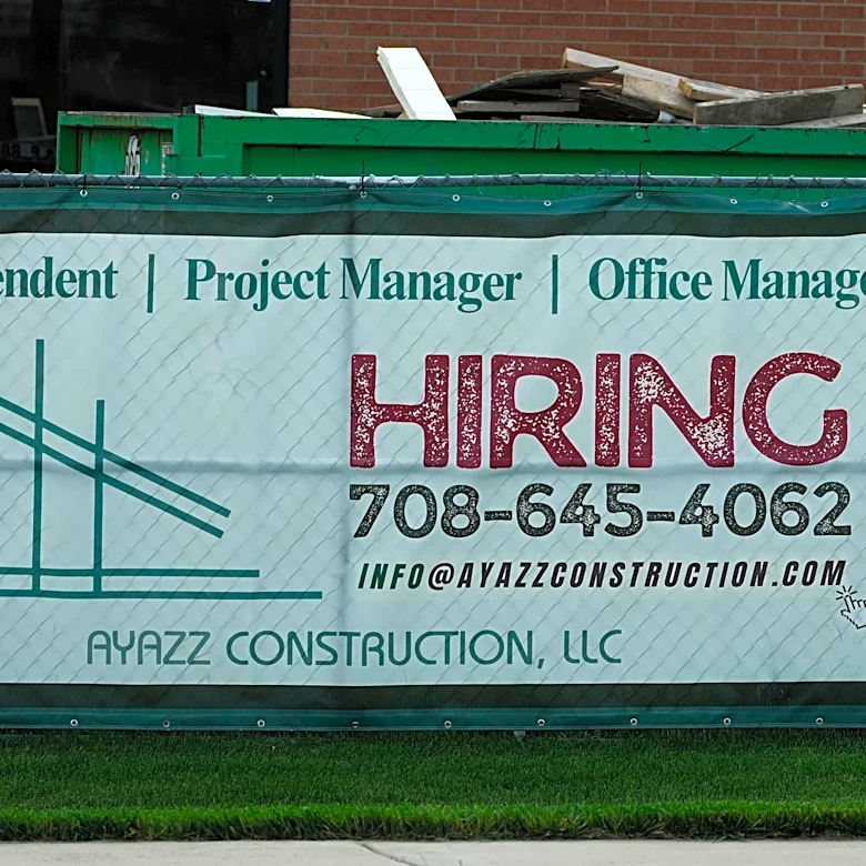U.S. filings for jobless aid fall to 215,000 as layoffs remain at historically healthy levels