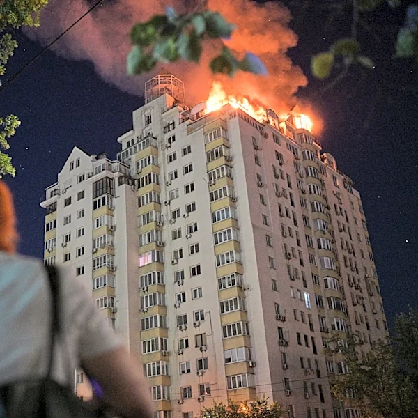 A major Russian attack kills 20 in Kyiv as Ukrainian strikes disrupt Moscow's oil sector
