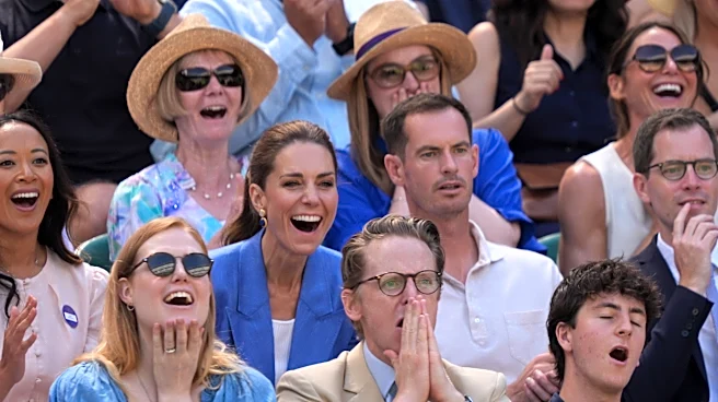 Princess Kate greets fans at Wimbledon and sits next to Andy Murray to watch the tennis