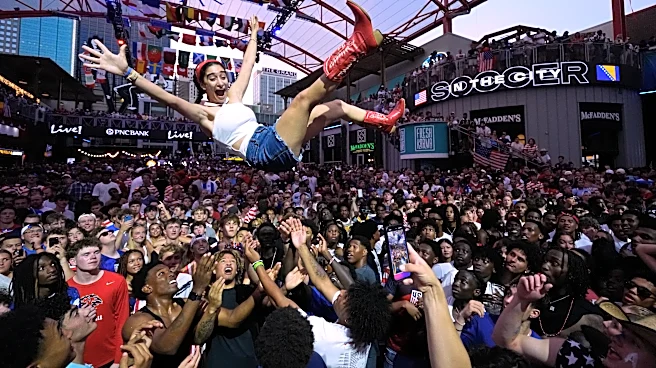 One Extraordinary Photo: Fan goes airborne to celebrate U.S. win