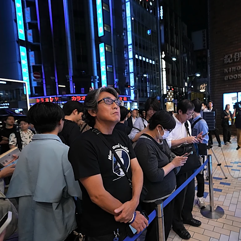 Fans mark the release of new Haruki Murakami novel at a midnight event in Tokyo