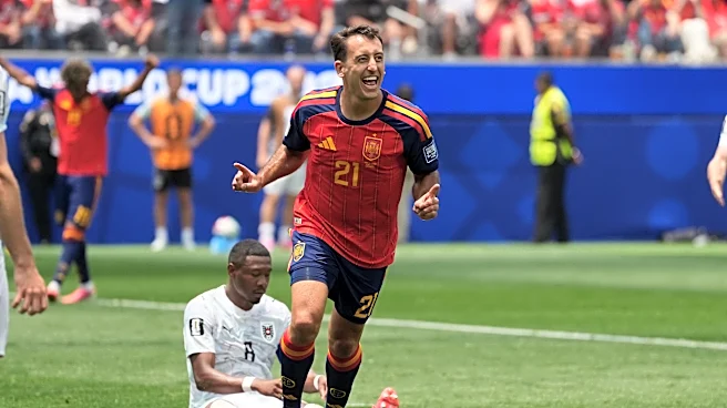 Mikel Oyarzabal's 2 goals send dominant Spain past Austria 3-0 and into round of 16 at the World Cup