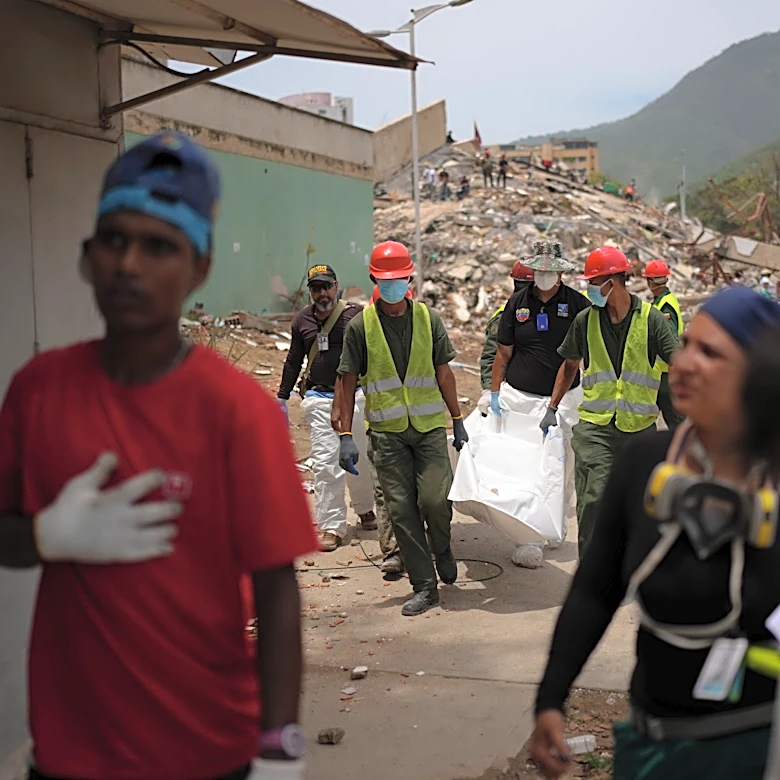 Venezuelans are rushing to identify the bodies of their loved ones as earthquake deaths multiply